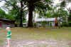 prompt child on swing and in yard.jpg (49930 bytes)